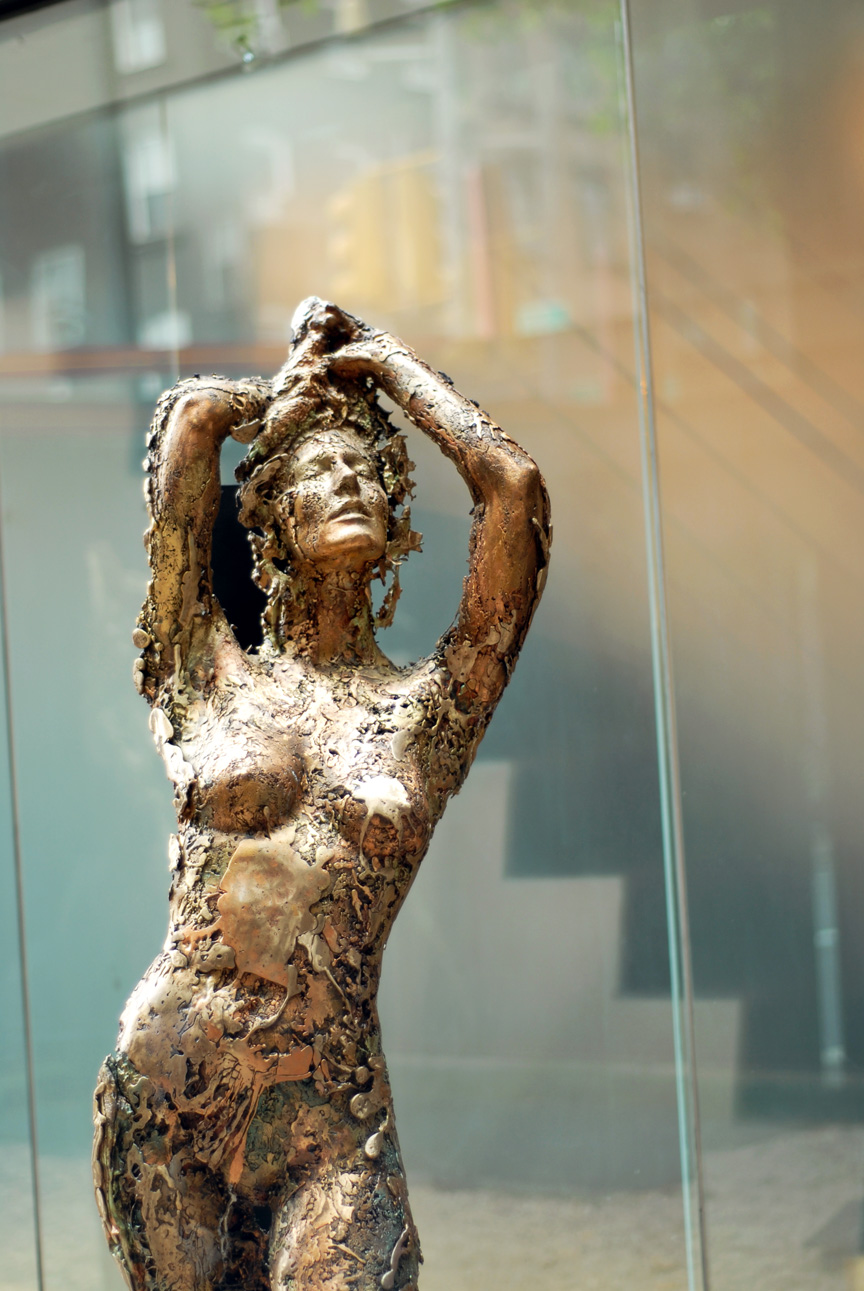 Golden Woman Sculpture