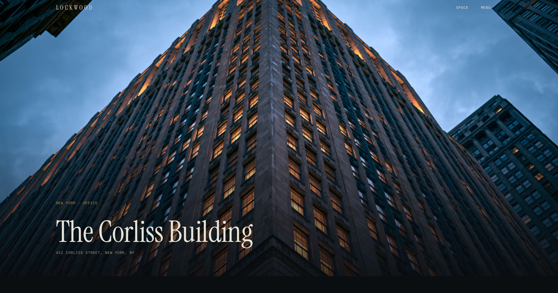 Lockwood website &mdash; The Corliss Building page, a full-bleed tower at dusk